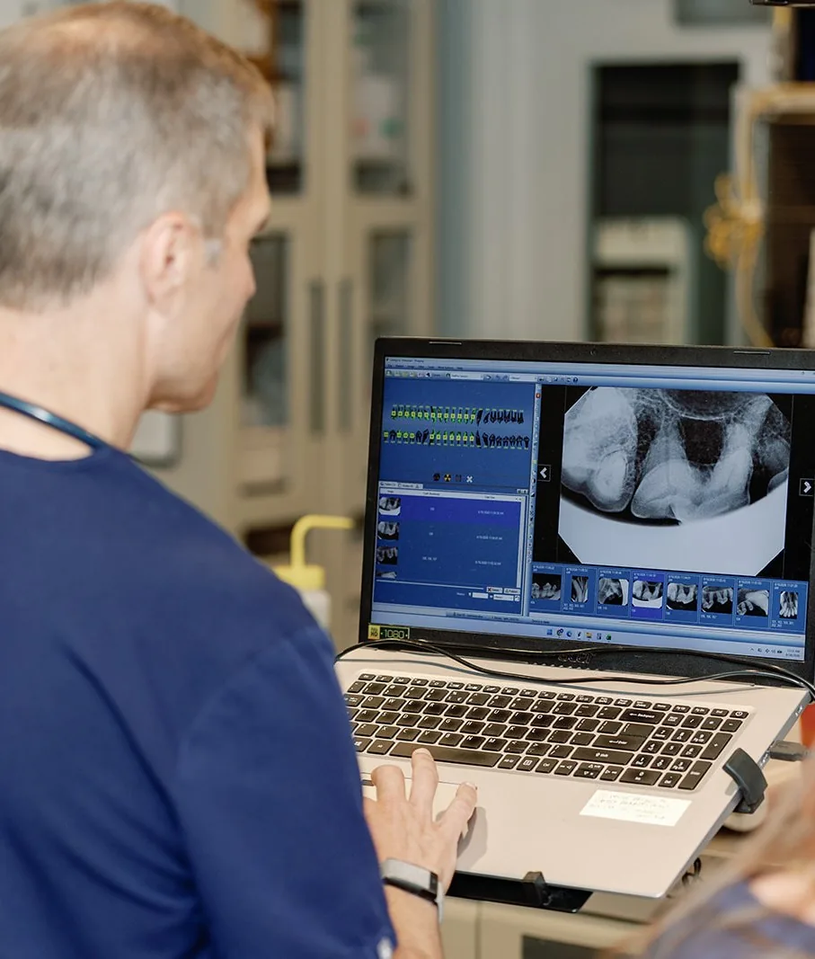 A digital dental radiograph on screen moments after it was taken