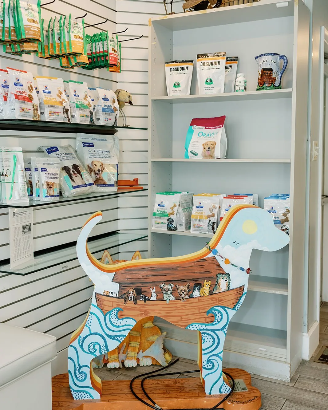 Pet food and dental chews on the retail shelves at Noah's Ark